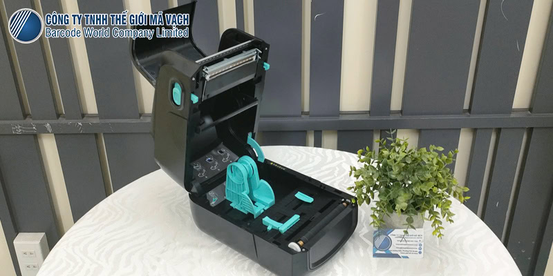 Máy in mã vạch Gainscha GA-2408T chứa chuộn mực in 300m